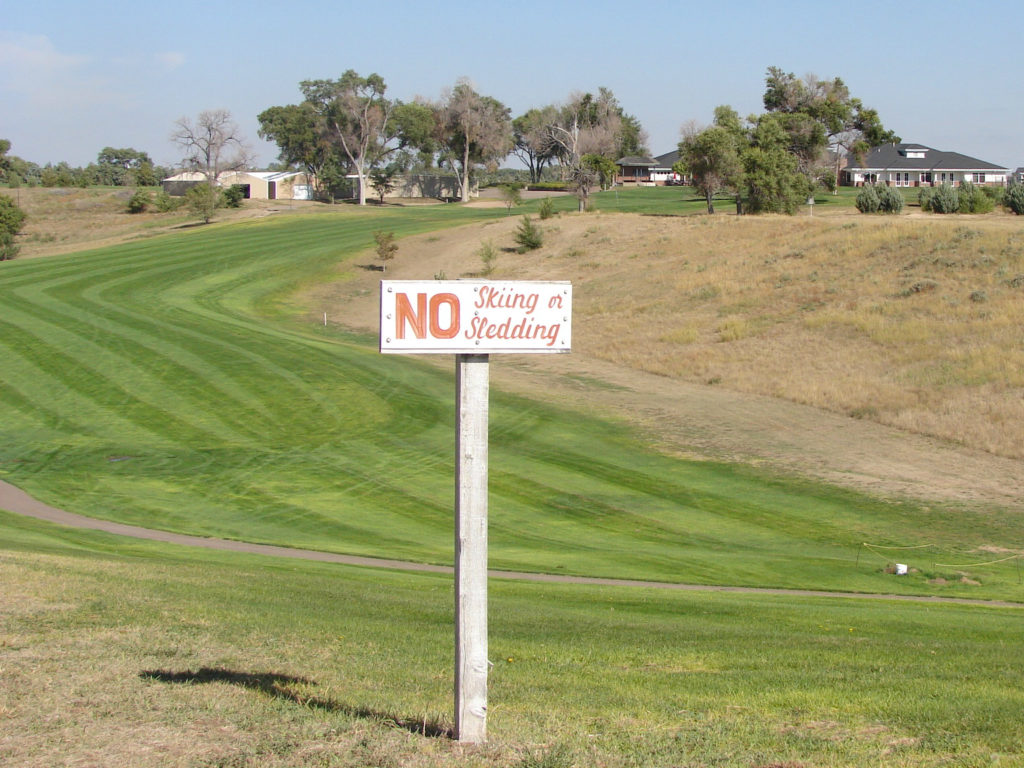 No sledding or skiing on the course